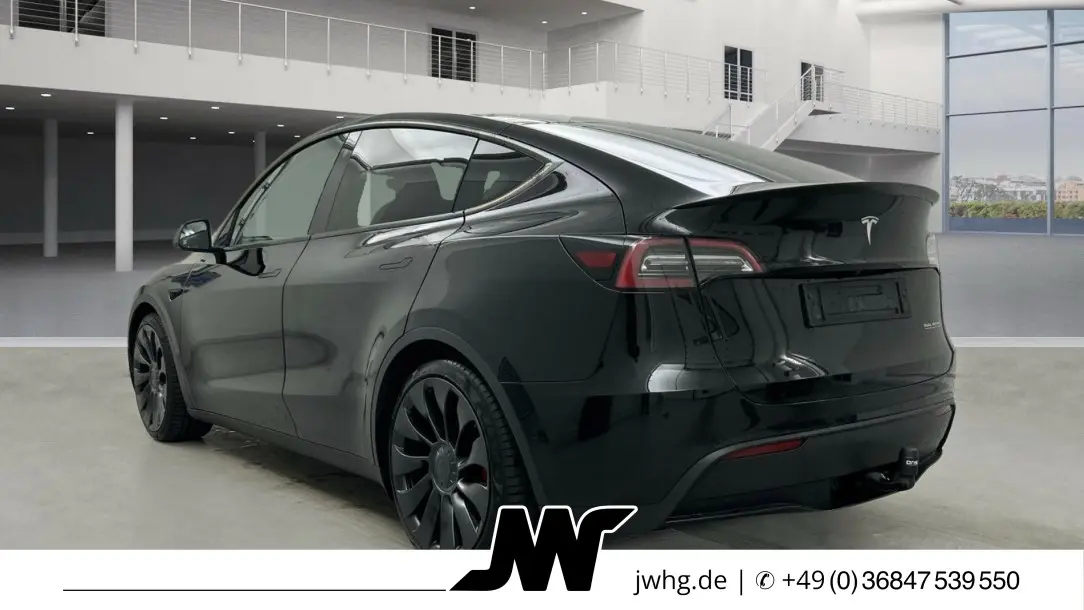 Tesla Model Y 4x4 393 kW Automatik Baujahr 2022, schwarz, 100.000 km, Deutschland — Foto 3 von 12